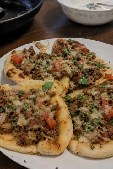 Delicious Beef Flatbreads topped with fresh veggies and sauce