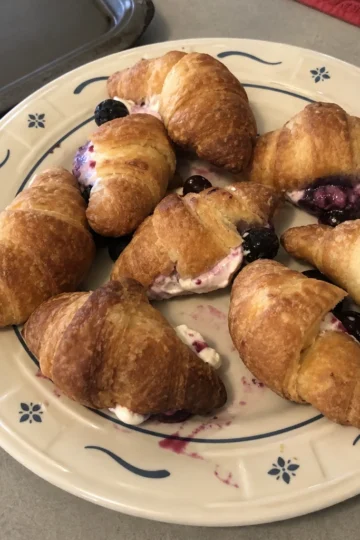 Flaky stuffed croissants with berries and cream cheese