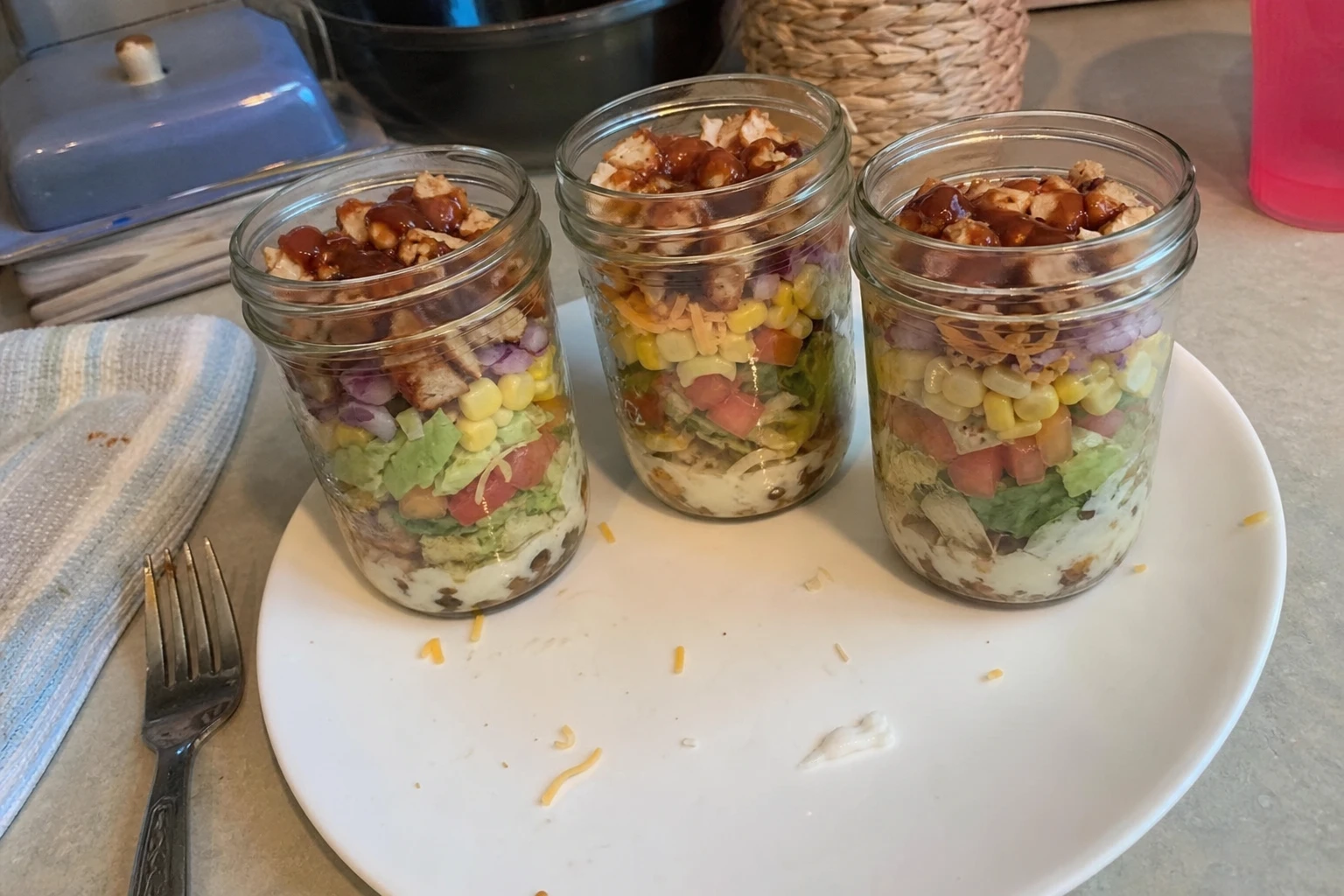 Close-up of the vibrant ingredients in a salad jar
