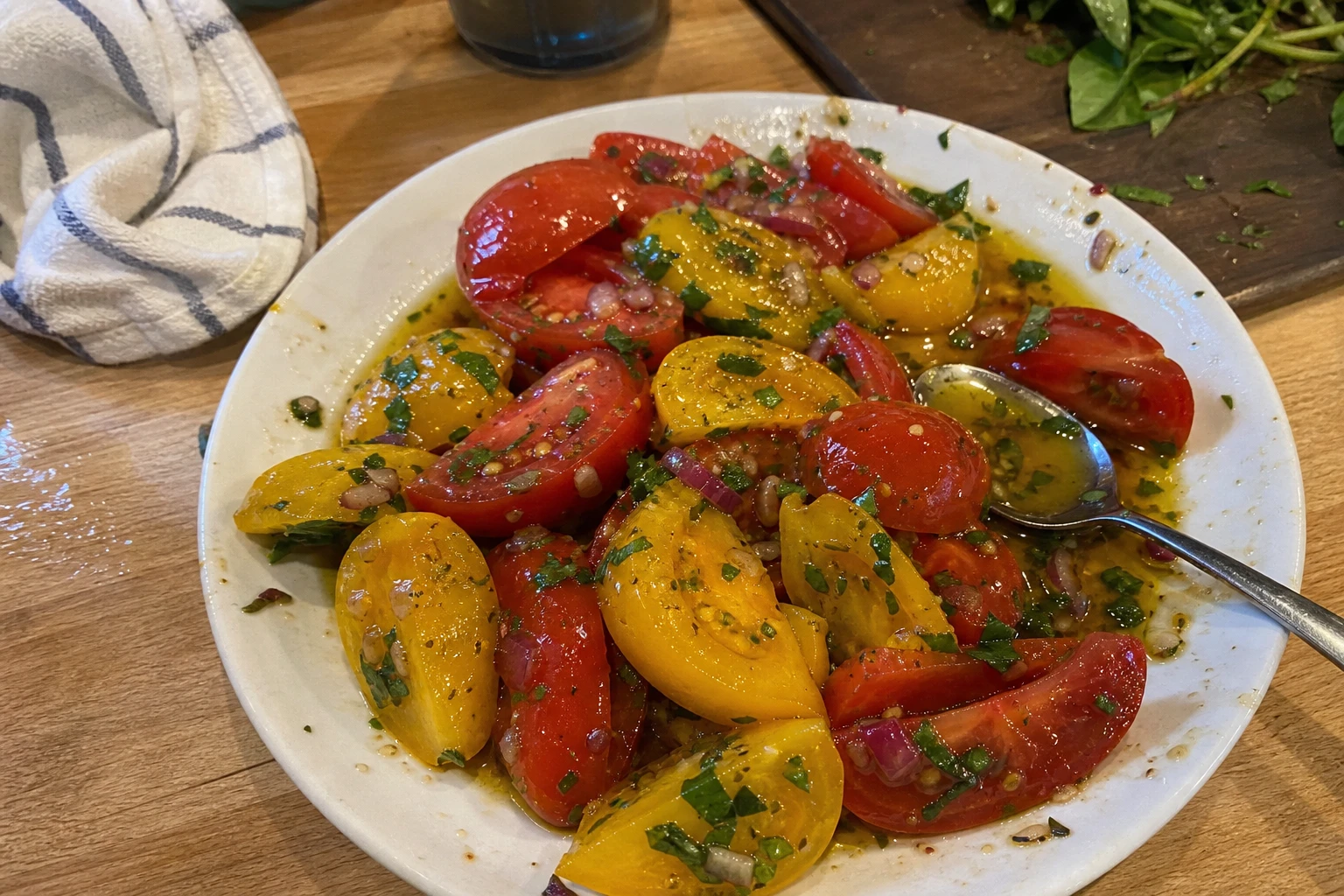 Chopped tomatoes drizzled with olive oil and garlic marinade