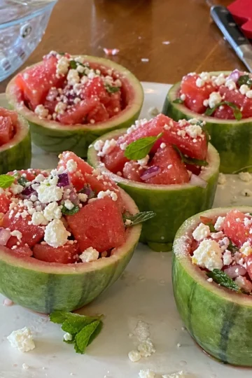 Colorful no-bake watermelon salad cups served in white bowls