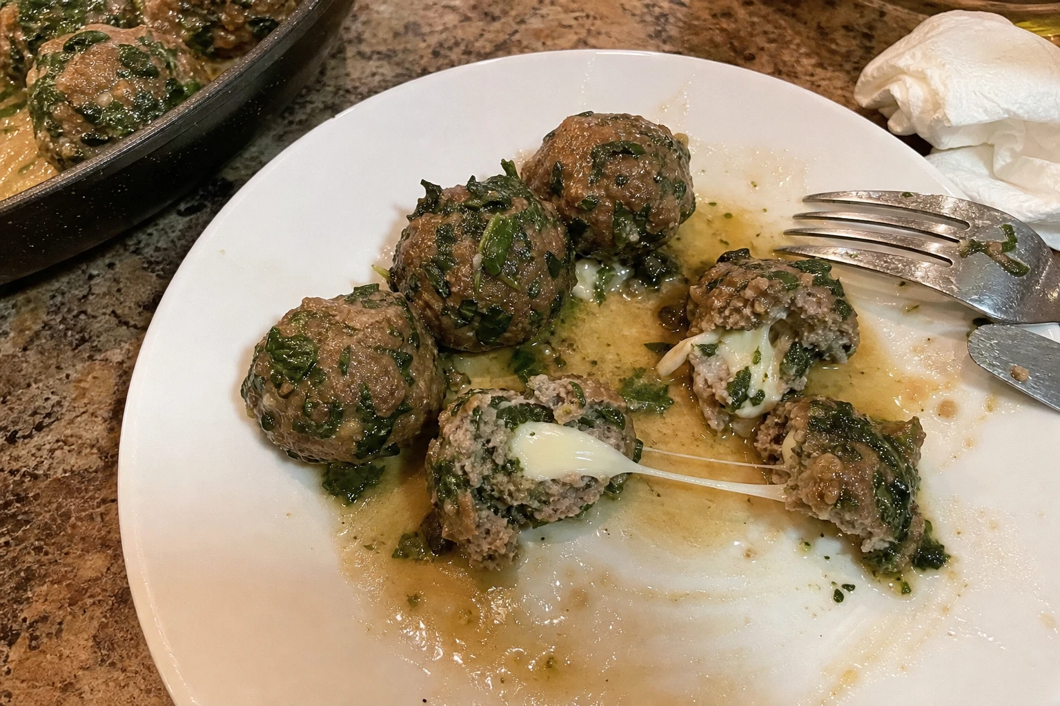 spinach garlic meatballs stuffed with mozzarella