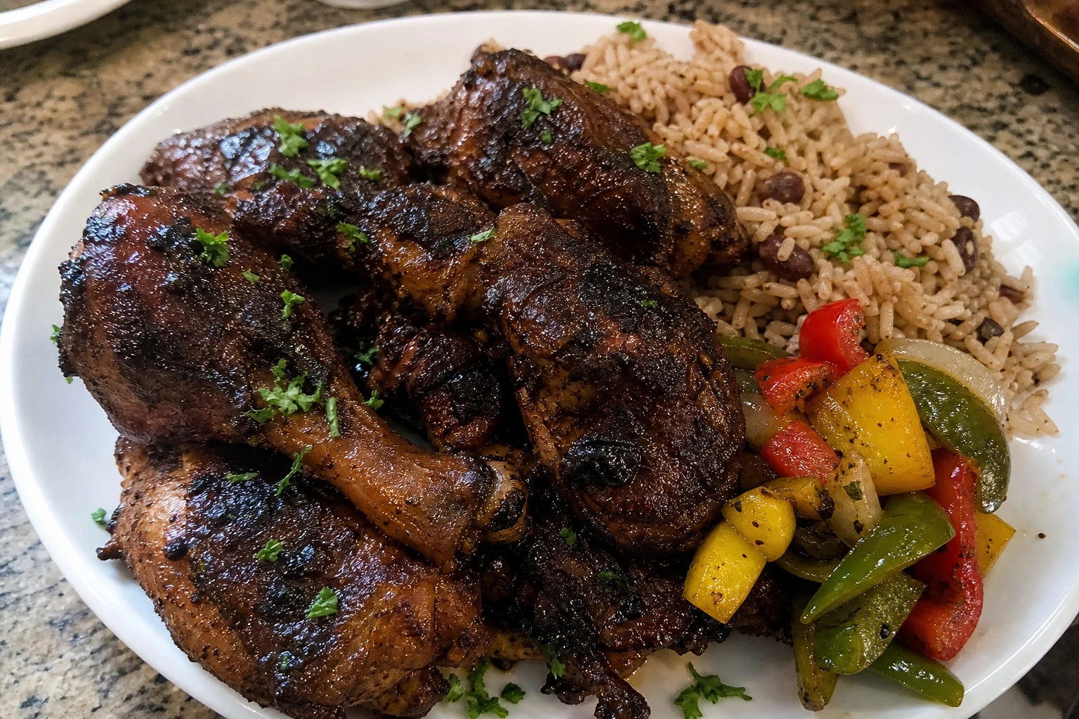 Marinated jerk chicken marinating in a bowl
